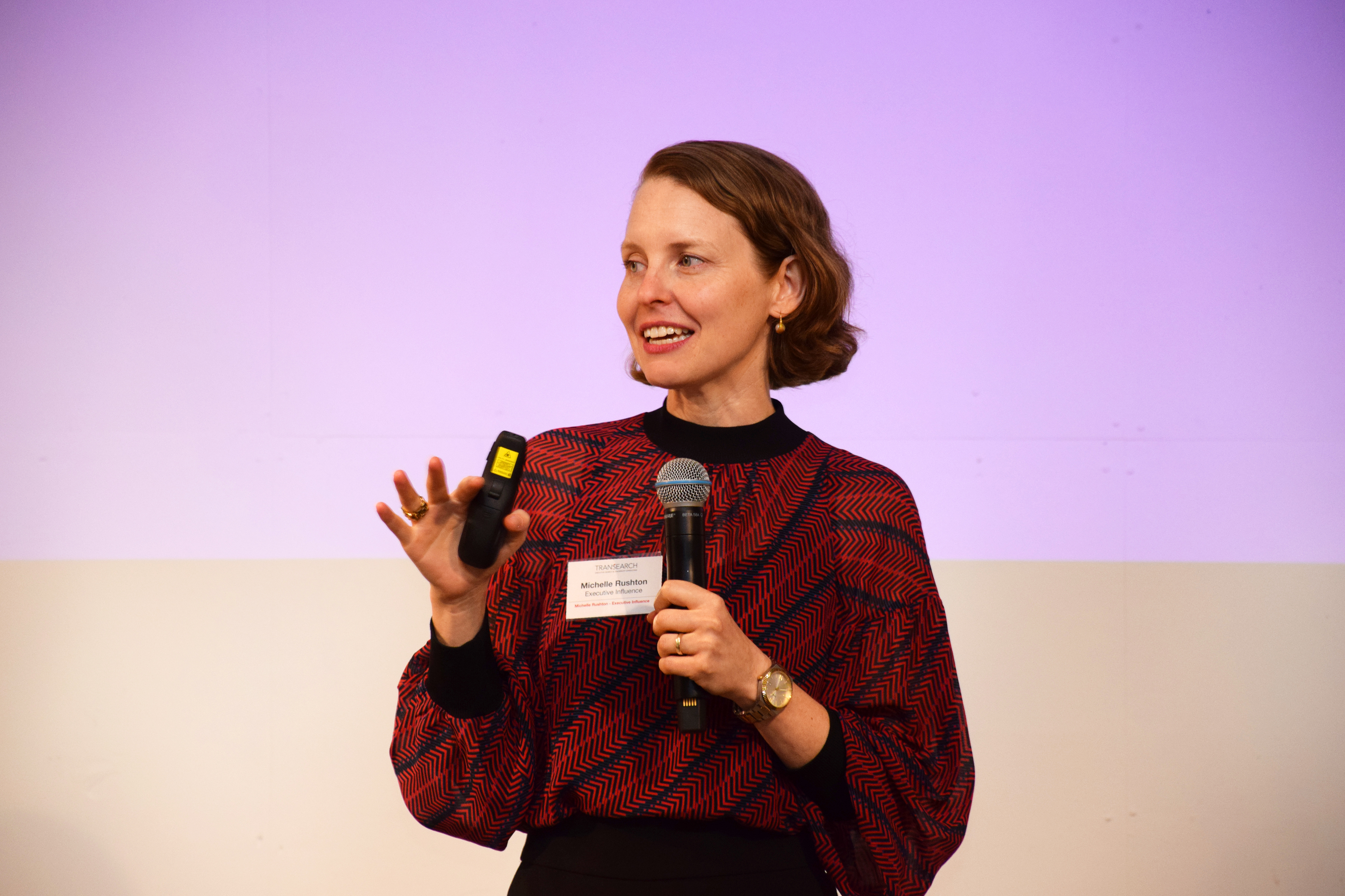 Michelle Rushton presenting with microphone